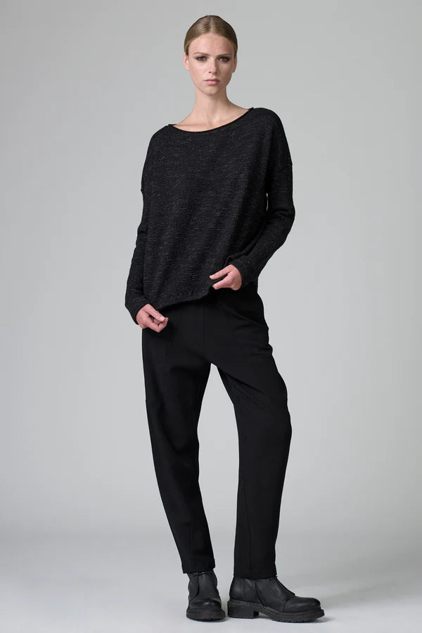 Oversize knit in micro-patterned wool and cotton with buttoning on the back
