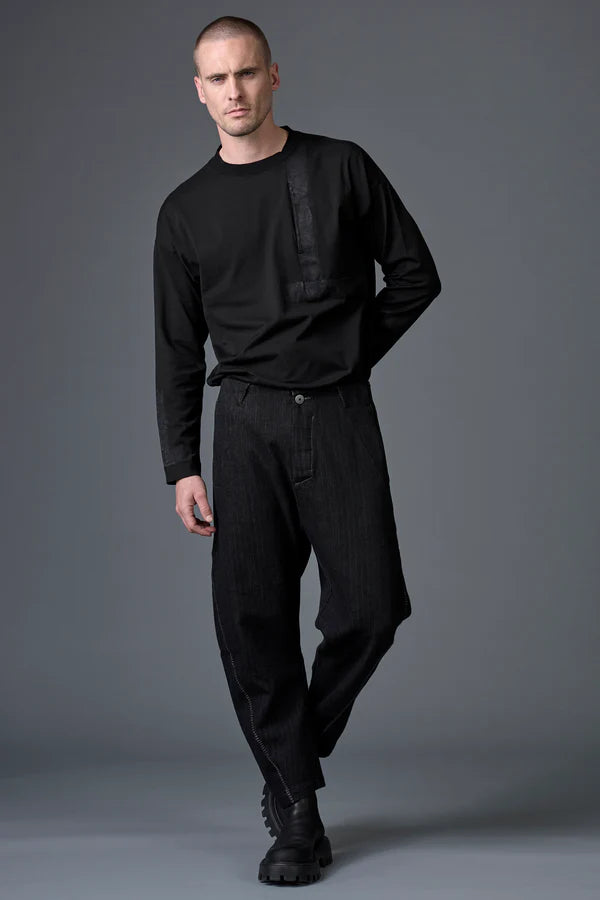 Ergonomic trousers in herringbone cotton and wool with contrasting thick yarn stitching