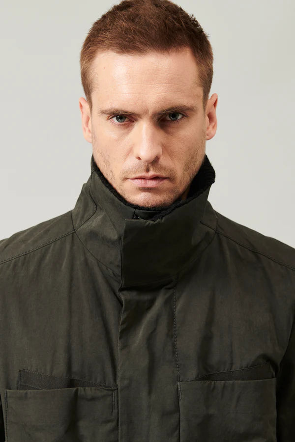 Cotton and nylon water-repellent trench coat. ribbed wool knit collar and cotton canvas inserts