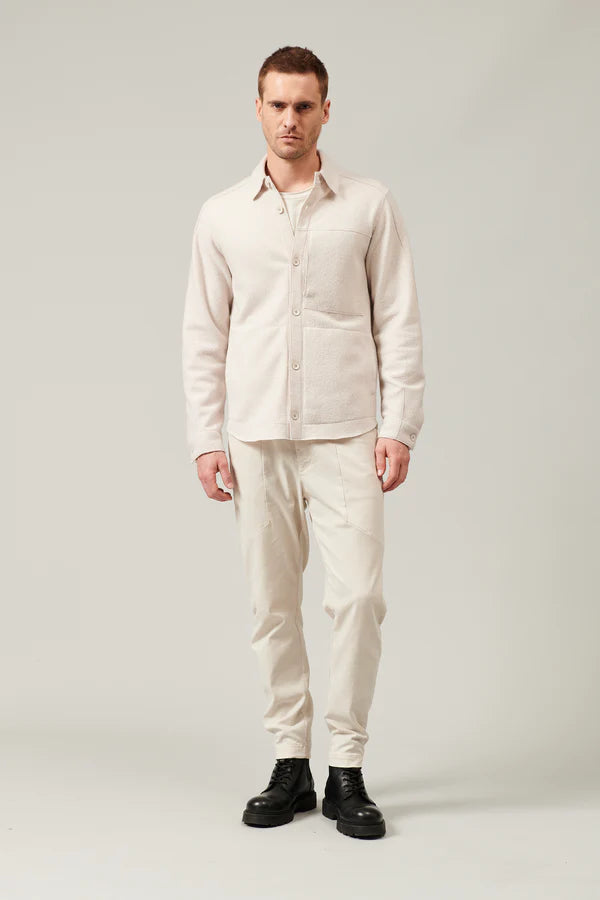 Raw cut boiled wool regular overshirt. buttoned opening, zipped chest pocket