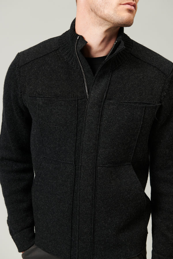 Cabl� virgin wool zipped knitted jacket with raw cut boiled wool inserts black