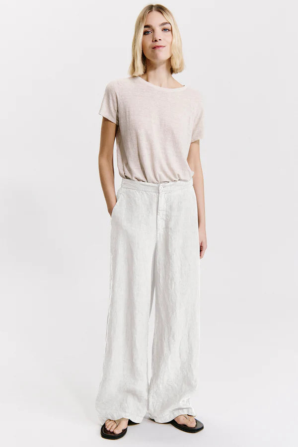 Linen palazzo trousers with elastic at the back. button and zip opening white