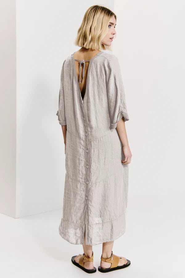 Linen double v-neck dress with kimono sleeves and button list at back. georgette inserts. wearable rope