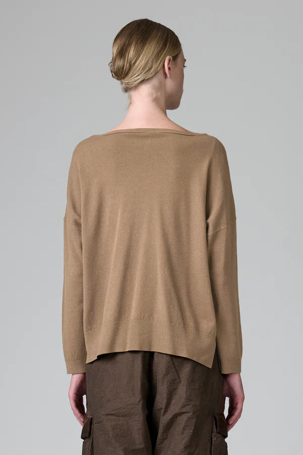 Oversized viscose and wool stretch knit. boxed shaped and boat neck
