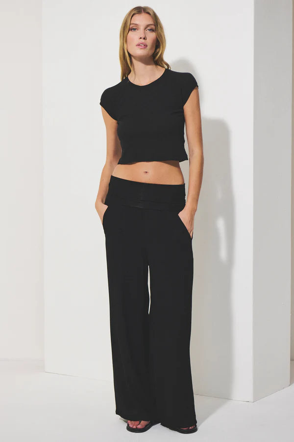 Long wide-leg trousers with elastic waistband in micro-textured stretch viscose