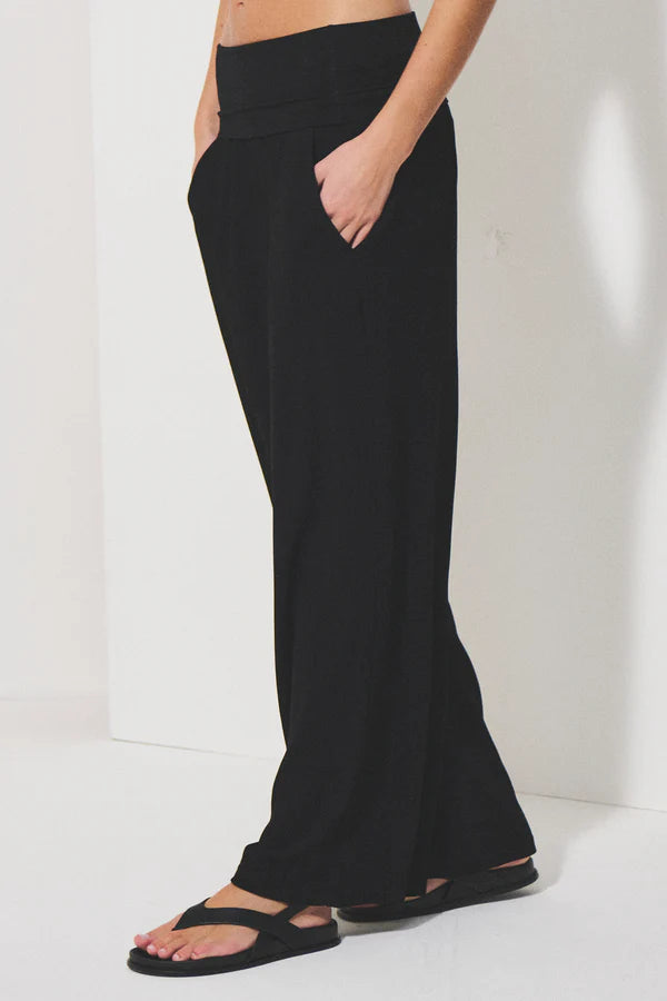 Long wide-leg trousers with elastic waistband in micro-textured stretch viscose